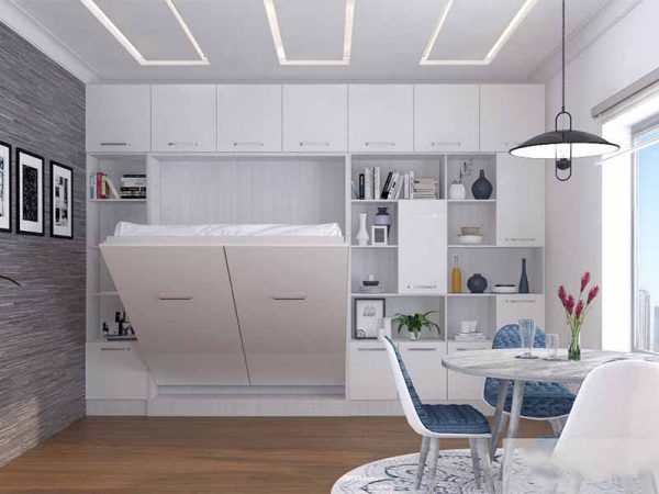 Giường và tủ màu trắng tạo cảm giác không gian rộng hơn